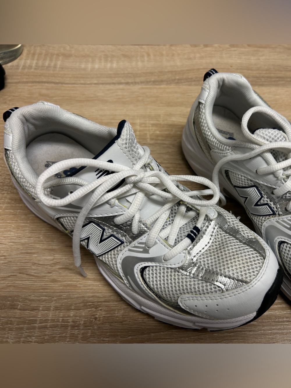 New Balance White & Silver Athletic Sneakers with Navy Accents